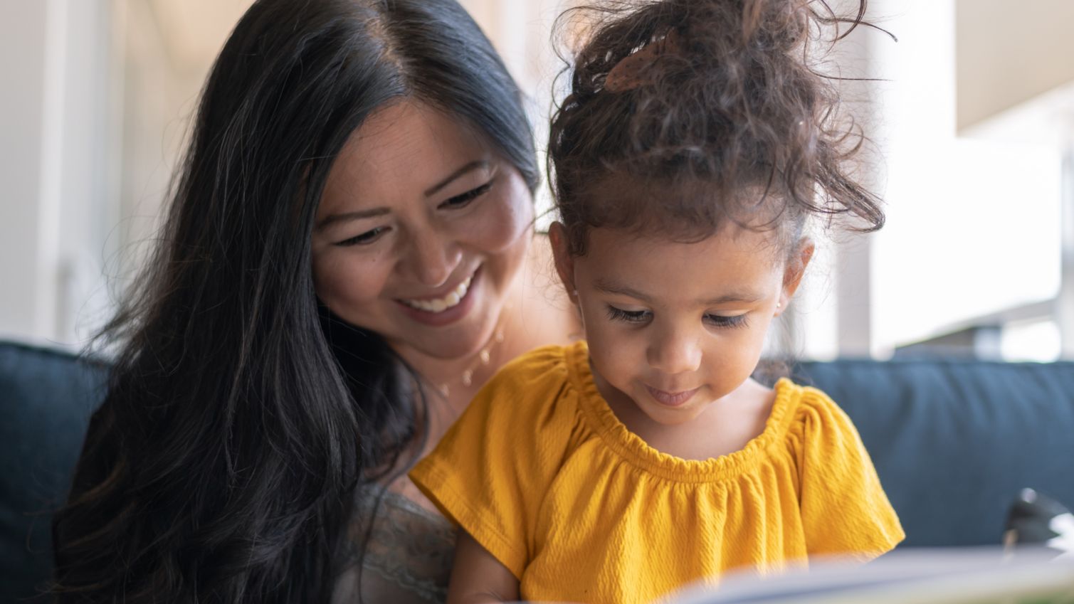 Mom and daughter read together